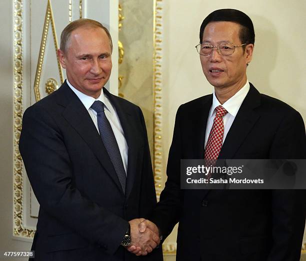 Chinese Vice Prime Minister Zhang Gaoli attends a meeting with Russian President Vladimir Putin in the Konstantin Palace in Saint Petersburg, Russia,...
