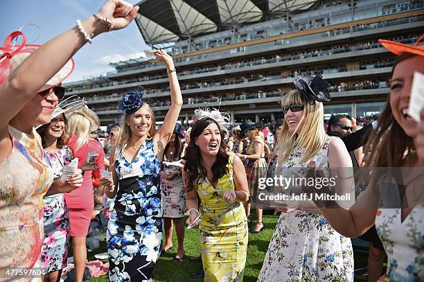 Racegoers attend Ladies Day at Royal Ascot Racecourse on June 18, 2015 in Ascot, England. The Royal Ascot horse race meeting runs from June 16, until...