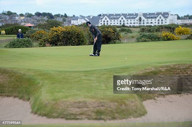 Mateusz Gradecki of Poland putts on the 13th green during The Amateur Championship 2015 - Day Four at Carnoustie Golf Club on June 18, 2015 in...