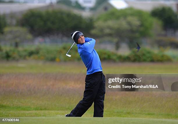 Jack McDonald of Kilmarnock plays his second shot on the 12th fairway during The Amateur Championship 2015 - Day Four at Carnoustie Golf Club on June...