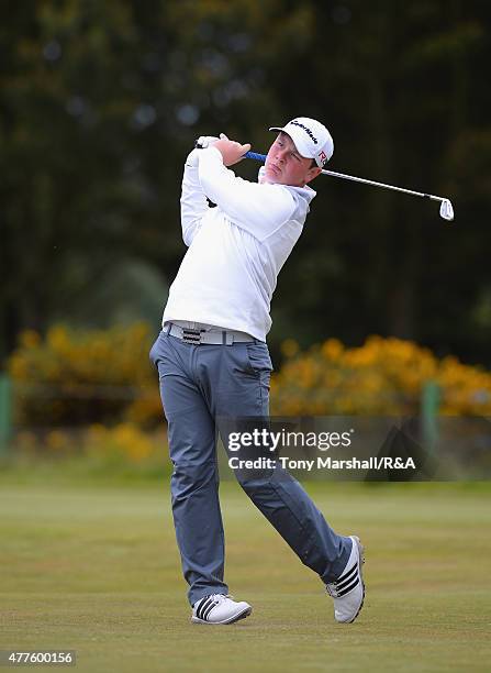 Robert MacIntyre of Glencruitten plays his first shot on the 13th tee during The Amateur Championship 2015 - Day Four at Carnoustie Golf Club on June...