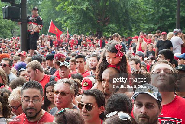 Fans wait for the start of a parade to celebrate the Chicago Blackhawks' winning of the Stanley Cup on June 18, 2015 in Chicago, Illinois. On Monday...