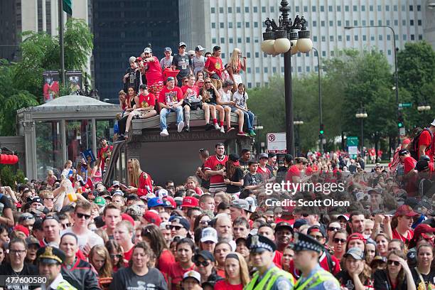 Fans wait for the start of a parade to celebrate the Chicago Blackhawks' winning of the Stanley Cup on June 18, 2015 in Chicago, Illinois. On Monday...