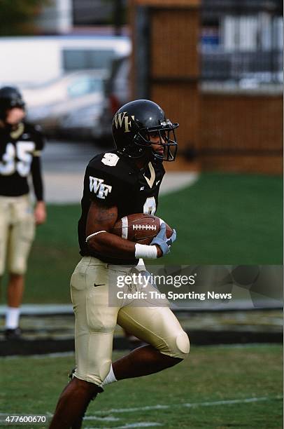 Eric King of the Wake Forest Demon Deacons runs with the ball against the North Carolina Tar Heels on October 26, 2002.