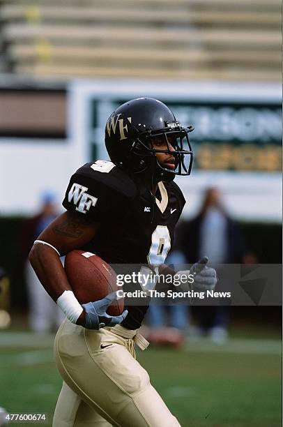 Eric King of the Wake Forest Demon Deacons runs with the ball against the North Carolina Tar Heels on October 26, 2002.