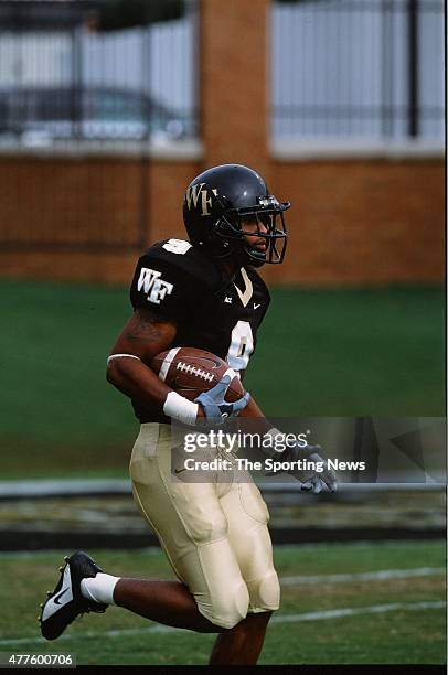 Eric King of the Wake Forest Demon Deacons runs with the ball against the North Carolina Tar Heels on October 26, 2002.