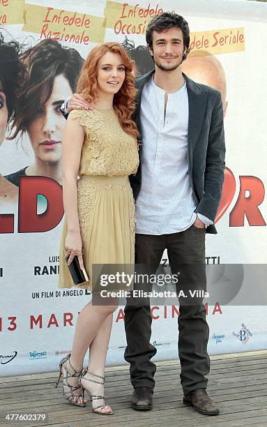 From left, actress Miriam Dalmazio and actor Eugenio Franceschini attend 'Maldamore' photocall at Villa Borghese on March 10, 2014 in Rome, Italy.