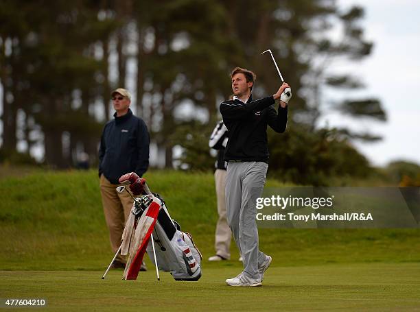 Ashley Chester of Hawkstone park plays his third shot on the 9th fairway during The Amateur Championship 2015 - Day Four at Carnoustie Golf Club on...