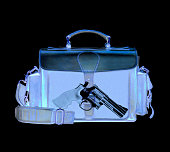 Xray scan detects weapon in criminals briefcase