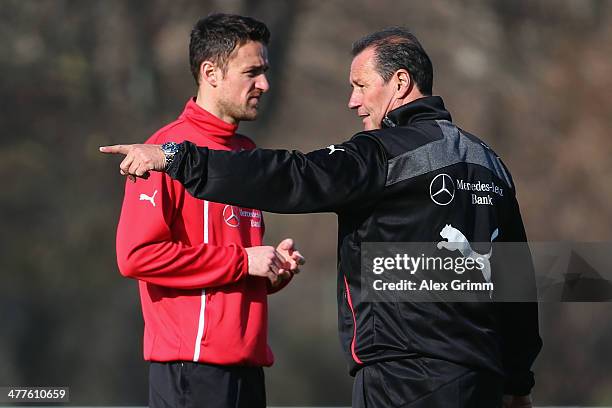 New head coach Huub Stevens and Christian Gentner of Stuttgart attend a training session at the club's training ground on March 10, 2014 in...