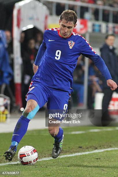 Nikica Jelavic of Croatia in action during the international friendly match between Switzerland and Croatia at the AFG Arena on March 5, 2014 in St...