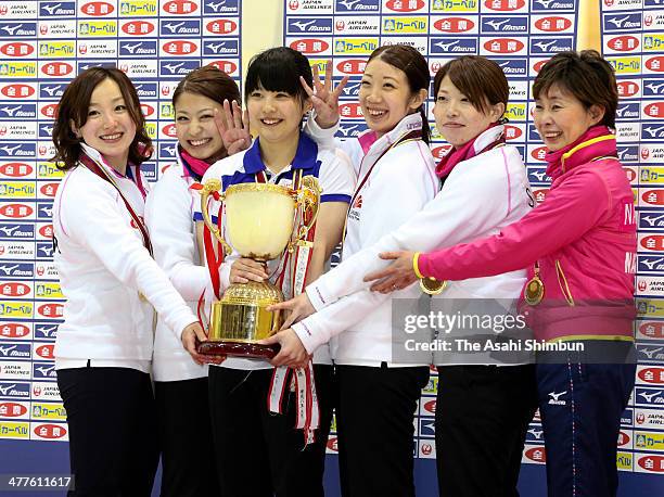 Satsuki Fujisawa, Miyo Ichikawa, Chiaki Matsumura, Emi Shimizu, Miyuki Sato and coach Hatomi Nagaoka of Chubu Electric Power Co pose for photographs...