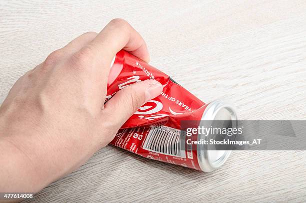 crumpled coca cola beverage - soft drink can stock pictures, royalty-free photos & images