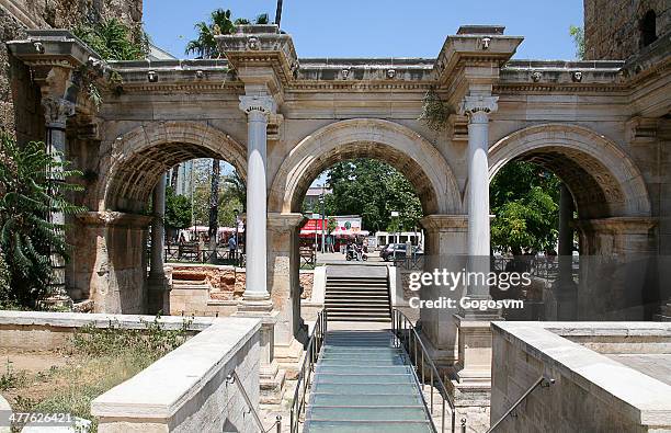 hadrian's gate, antalya - turkey - fortress gate and staircases stock pictures, royalty-free photos & images