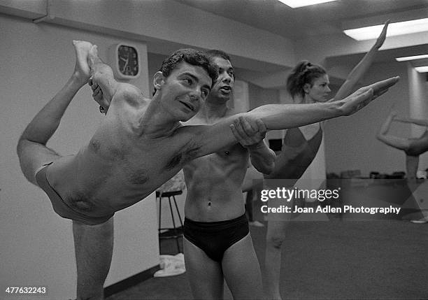 Founder and teacher of Bikram Yoga, Bikram Choudhury assists actor Richard Benjamin and wife Paula Prentiss with the 'Standing Bow Pose' at his yoga...