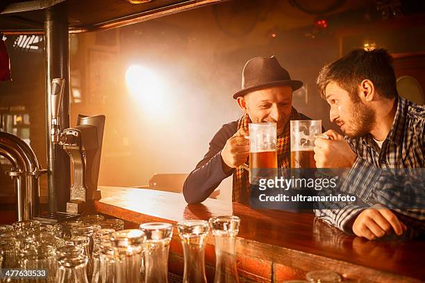 beer - male friends drinking beer stock pictures, royalty-free photos & images