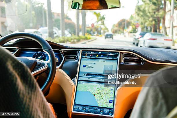 cockpit of tesla model s car - tesla interior stock pictures, royalty-free photos & images