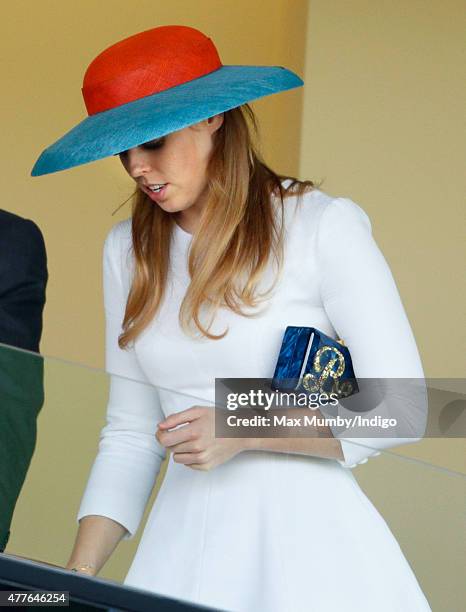 Princess Beatrice carries a personalised 'Bea' clutch bag as she attends day 3, Ladies Day, of Royal Ascot at Ascot Racecourse on June 18, 2015 in...