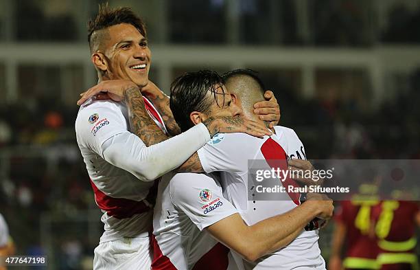 Claudio Pizarro of Peru celebrates with teammates after scoring the opening goal during the 2015 Copa America Chile Group C match between Peru and...