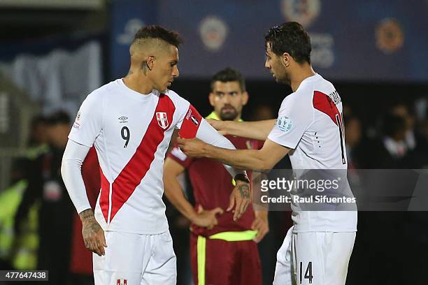 Claudio Pizarro of Peru gives the captains arm band to Paolo Guerrero of Peru during the 2015 Copa America Chile Group C match between Peru and...