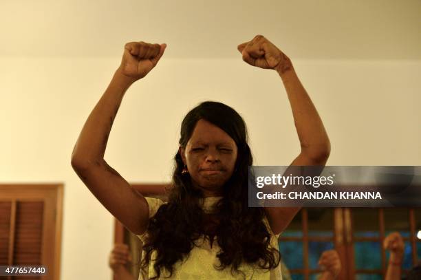 To go with story 'India-lifestyle-yoga-government' by Annie BANERJI In this photograph taken on June 14 26 year-old Indian acid attack survivor,...