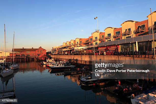 dawn, boats and houses in brighton marina - brighton marina stock pictures, royalty-free photos & images