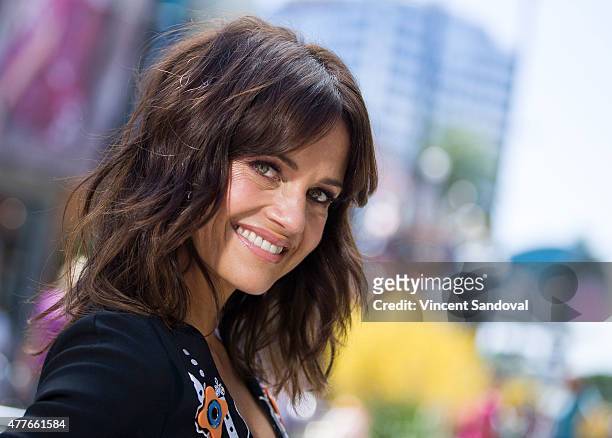 Actress Carla Gugino attends "Extra" at Universal Studios Hollywood on June 18, 2015 in Universal City, California.