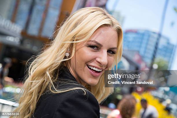 Personality Morgan Stewart attends "Extra" at Universal Studios Hollywood on June 18, 2015 in Universal City, California.