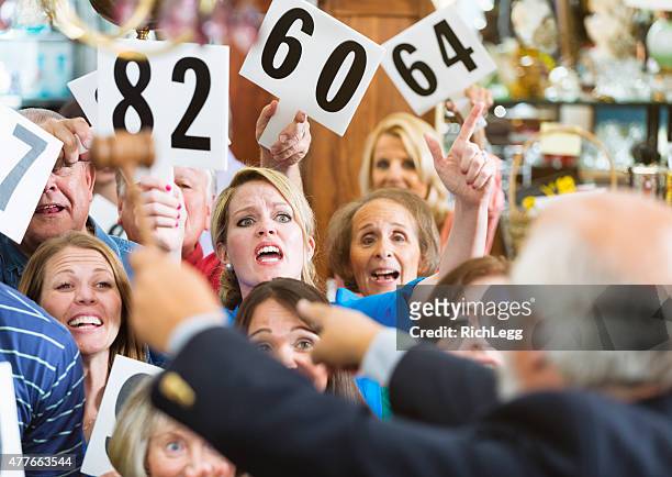 auction crowd - auction stock pictures, royalty-free photos & images