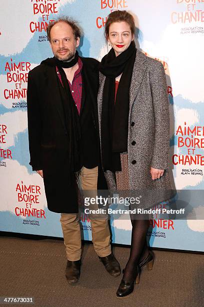 Actor Denis Podalydes and Leslie Menu attend the 'Aimer, Boire Et Chanter' Paris movie premiere. Held at Cinema UGC Normandie on March 10, 2014 in...