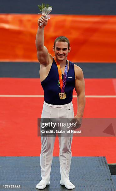 Gold medalist Arthur Zanetti of Brazil in the podium of Men's Rings during day four of the X South American Games Santiago 2014 at Centro de Alto...