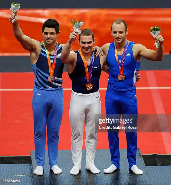 Sergio Molinari of Argentina, Arthur Zanetti of Brazil and Juan Raffo of Chile in the podium of Men's Rings during day four of the X South American...
