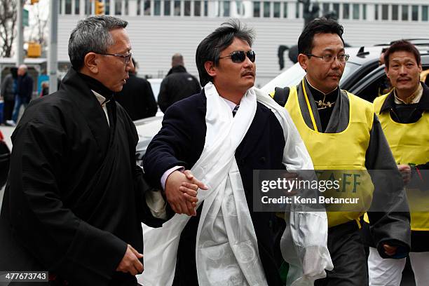 Chinese dissident Chen Guangcheng attends the 55th anniversary of the Tibetan national uprising day rally outside the United Nations building on...