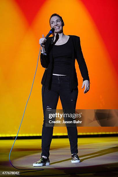 Whitney Cummings performs through the rain during the opening night of SeriesFest at Red Rocks Amphitheatre on June 18, 2015 in Morrison, Colorado.