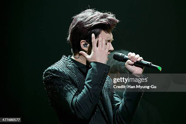 Woohyun of South Korean boy band Infinite performs onstage during his first mini album the "Toheart" Woohyun & Key Showcase at COEX Artium on March...