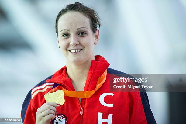 Kristel Kobrich, of Chile shows her gold medal after winning in womens 1500m freestyle final event during day four of the X South American Games...