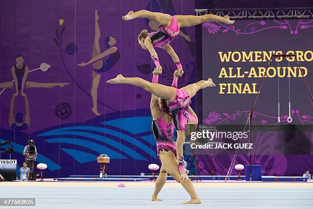 Britain's gymnasts compete in the women's group all-around final of the acrobatic gymnastics event at the 2015 European Games in Baku on June 19,...