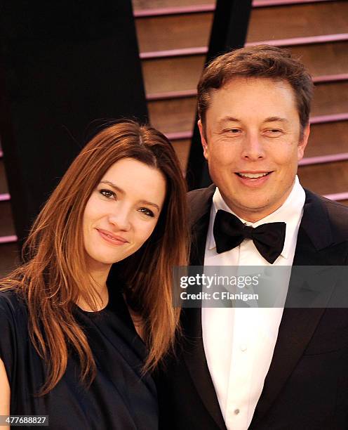 Actress Talulah Riley and CEO of Tesla Motors Elon Musk arrive to the 2014 Vanity Fair Oscar Party on March 2, 2014 in West Hollywood, California.