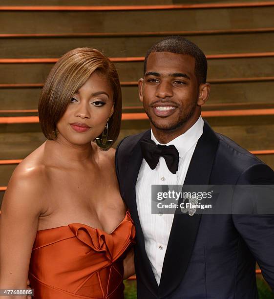 Athlete Chris Paul and guest Jada Crawley arrive to the 2014 Vanity Fair Oscar Party on March 2, 2014 in West Hollywood, California.