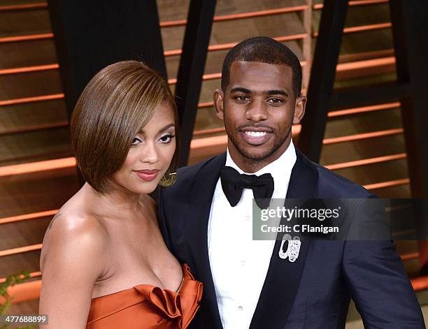 Athlete Chris Paul and guest Jada Crawley arrive to the 2014 Vanity Fair Oscar Party on March 2, 2014 in West Hollywood, California.
