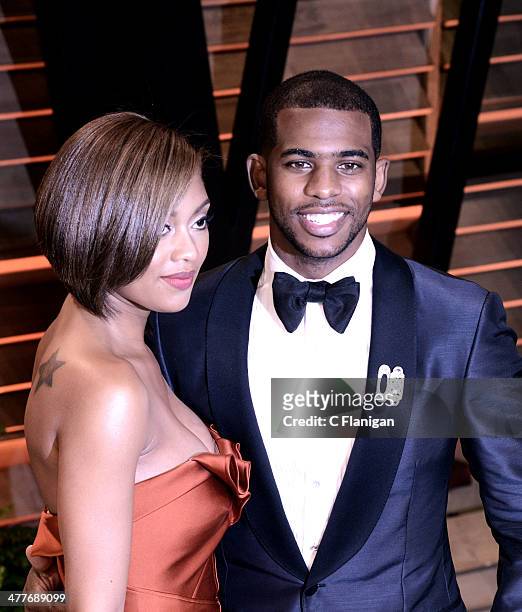 Athlete Chris Paul and guest Jada Crawley arrive to the 2014 Vanity Fair Oscar Party on March 2, 2014 in West Hollywood, California.