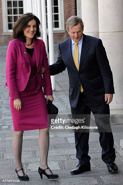 Northern Ireland Secretary of State Theresa Villiers greets Irish Taoiseach Enda Kenny at the 24th British-Irish Council Summit at Dublin Castle on...