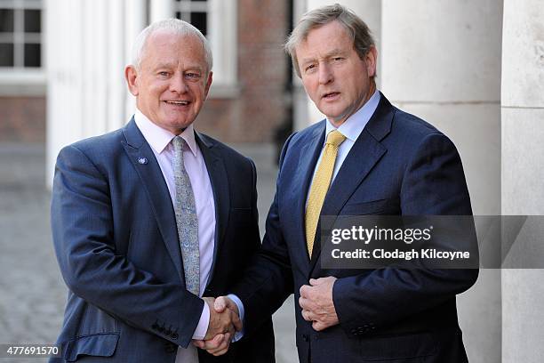 Isle of Man Chief Minister Hon. Allan Bell MHK greets Irish Taoiseach Enda Kenny at the 24th British-Irish Council Summit at Dublin Castle on June...