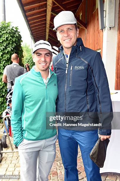 Philipp Lahm and Oliver Bierhoff attend the Young Wings Charity Golf Cup 2015 at Golfclub Munchen -Riedhof e.V. On June 19, 2015 in Munich, Germany.