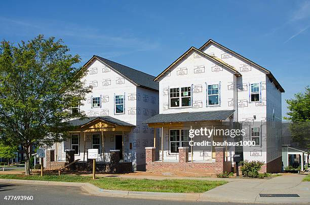 new home under construction - timber window frames stock pictures, royalty-free photos & images