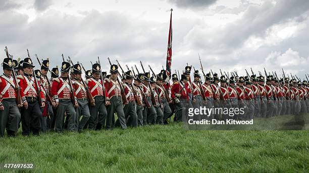 Historical re-enactors in period dress as members of the Allied Army participate in a practice drill on June 19, 2015 in Waterloo, Belgium. Around...