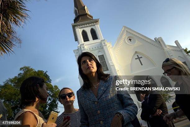 South Carolina Governor Nikki Haley waits to speak to press outside the Emanuel AME Church June 19, 2015 in Charleston, South Carolina. US police...