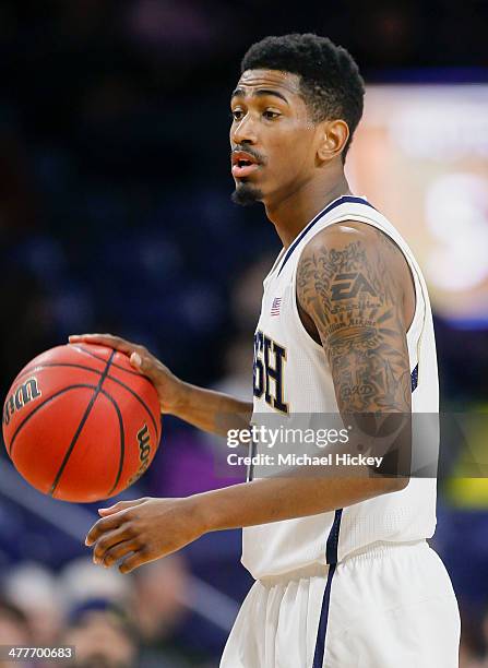 Eric Atkins of the Notre Dame Fighting Irish brings the ball up court during the game against the Georgia Tech Yellow Jackets at Purcel Pavilion on...