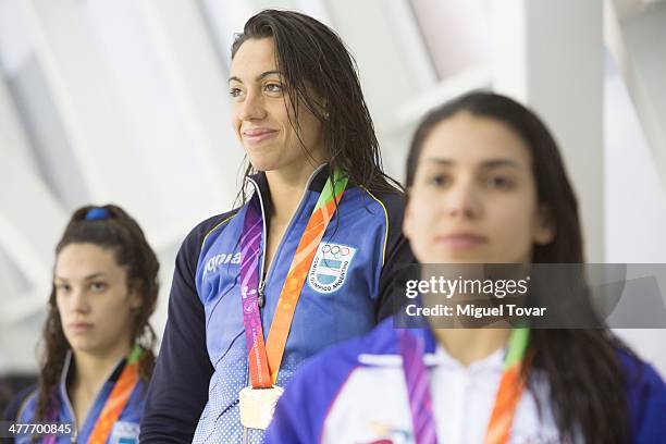 Macarena Ceballos of Argentina receives the gold medal in womens 100m breaststroke final event during day four of the X South American Games Santiago...