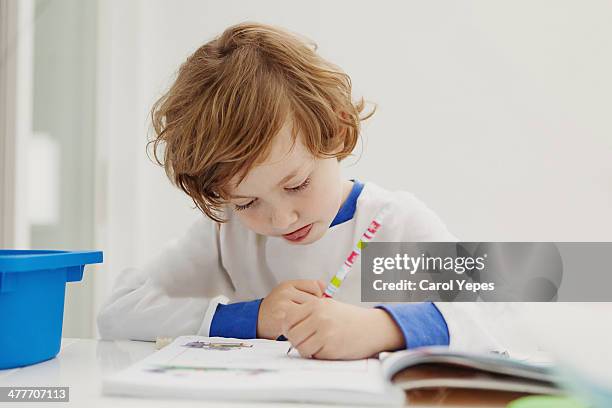studying - left hand holding pencil stock pictures, royalty-free photos & images